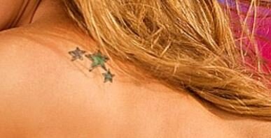 Small Stars on Upper back Tattoo
